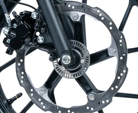 ABS (Anti-lock Braking System) adalah sistem pengereman yang mencegah roda terkunci saat pengendara melakukan pengereman mendadak.